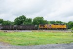 UP 7095 shoves on the rear of a southbound coal train 